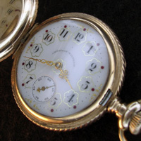 Waltham pocket watch with multi-colored dial filagree hands hunters case